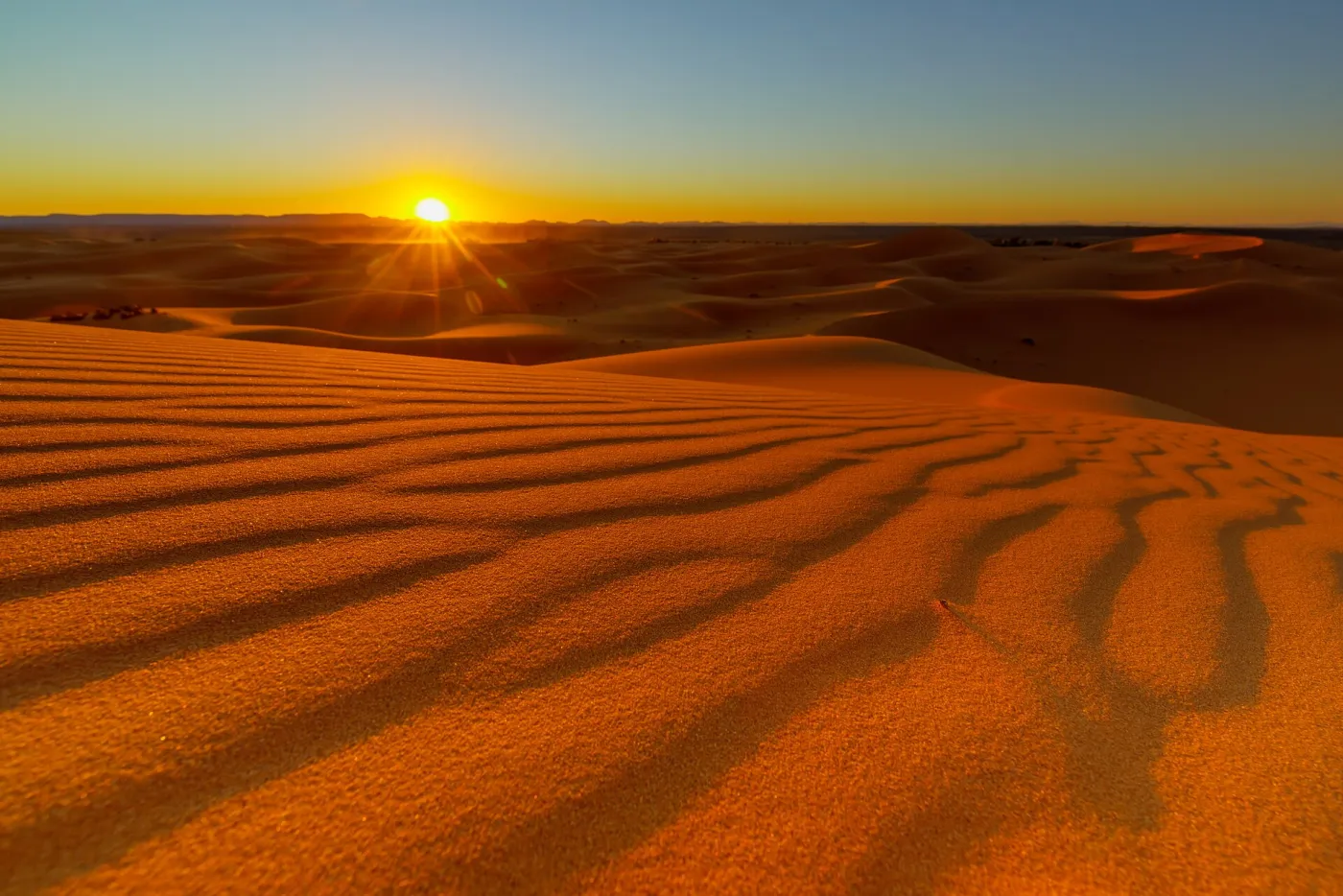 Golden Sahara dunes at sunset near Merzouga